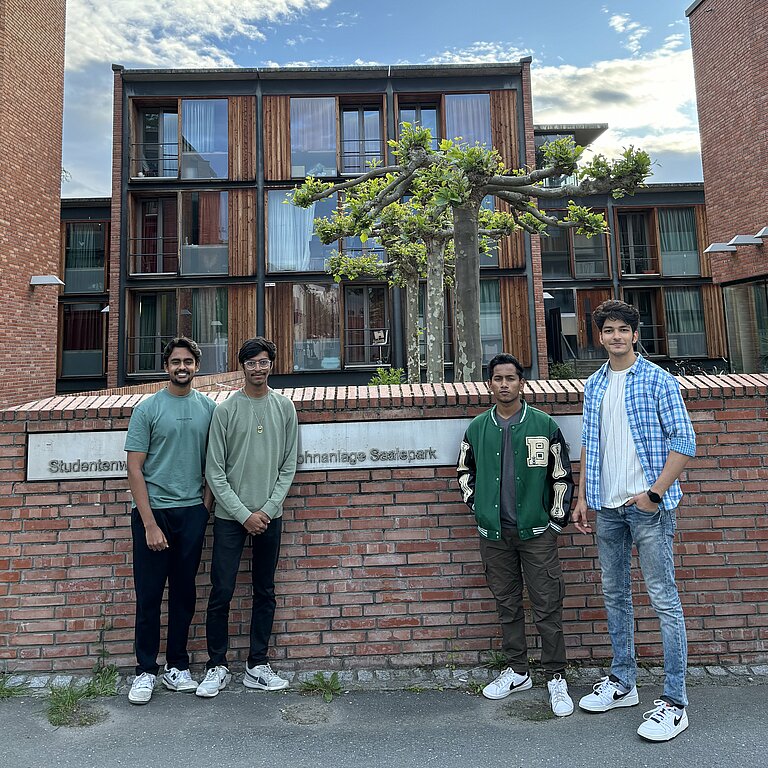 Sujal, Pratham, Aditya and Atharva from India in front of their dormitory "Am Saalepark"